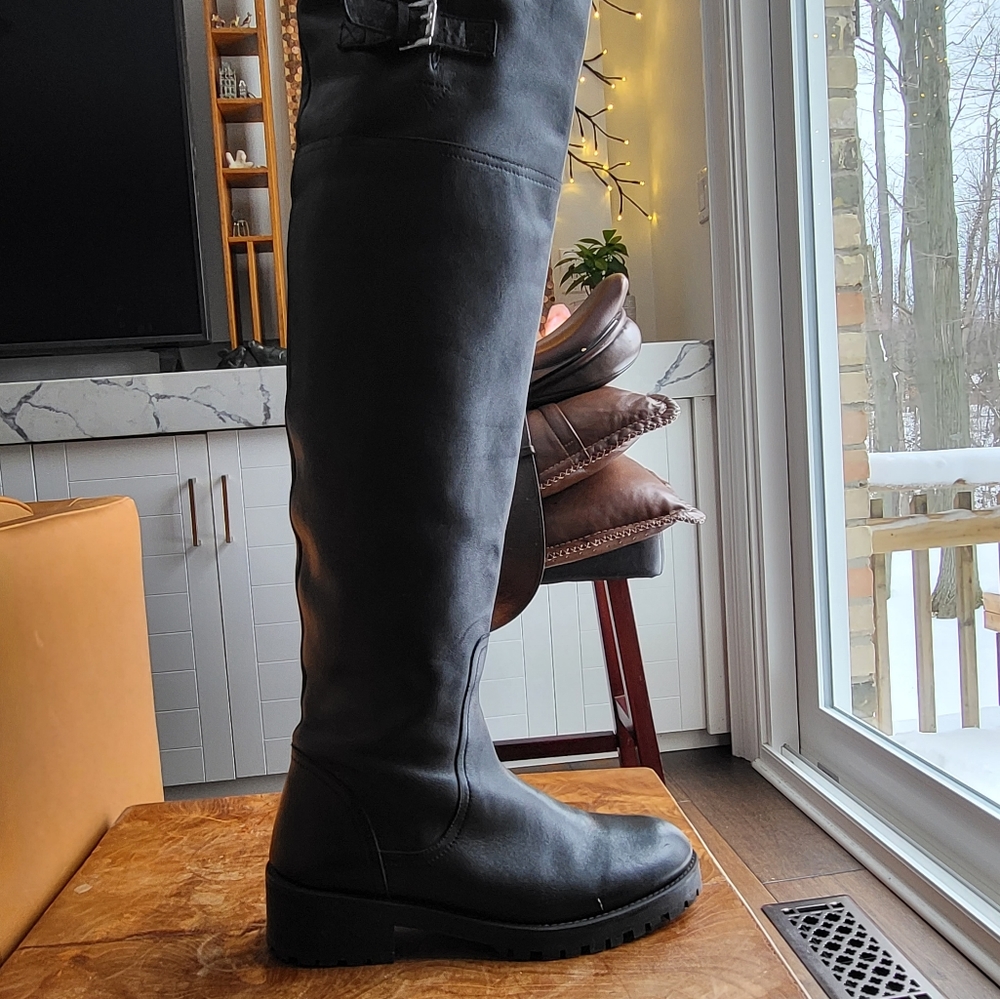 Over the knee black leather boots